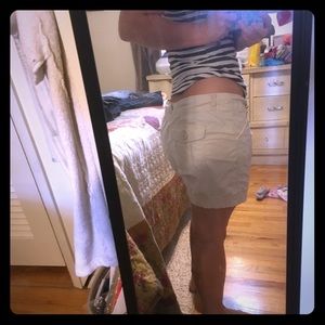 Tan mid rise shorts
